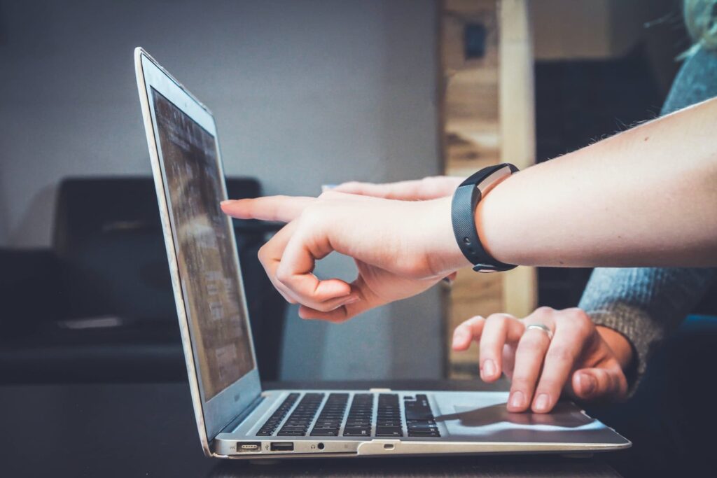 Jayden Wei Indication Finger Towards a Laptop